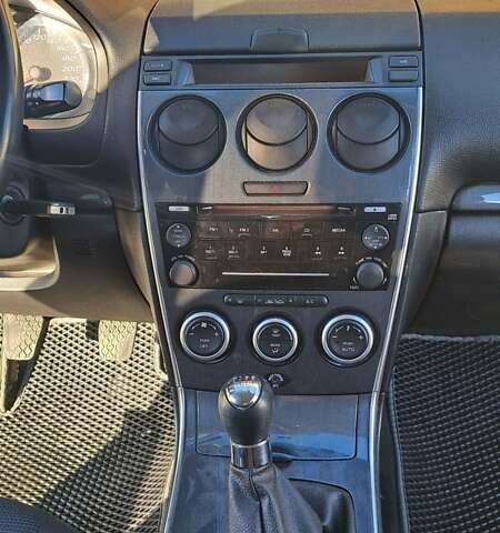 Серый Мазда 6, объемом двигателя 2 л и пробегом 295 тыс. км за 4100 $, фото 12 на Automoto.ua
