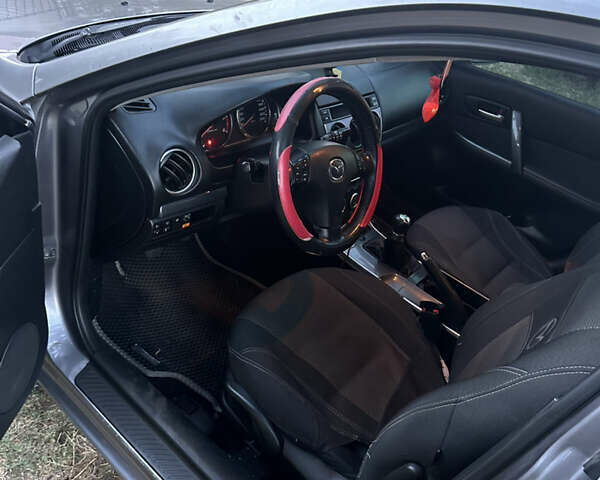 Серый Мазда 6, объемом двигателя 2 л и пробегом 291 тыс. км за 5000 $, фото 3 на Automoto.ua
