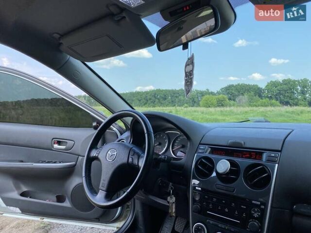 Серый Мазда 6, объемом двигателя 1.8 л и пробегом 211 тыс. км за 4700 $, фото 26 на Automoto.ua