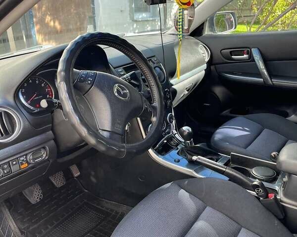 Серый Мазда 6, объемом двигателя 2 л и пробегом 230 тыс. км за 5000 $, фото 9 на Automoto.ua