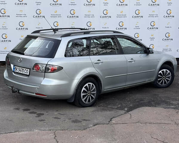 Сірий Мазда 6, об'ємом двигуна 2 л та пробігом 272 тис. км за 3999 $, фото 7 на Automoto.ua