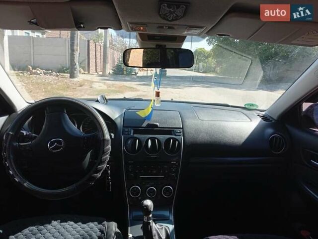Серый Мазда 6, объемом двигателя 2 л и пробегом 327 тыс. км за 4400 $, фото 1 на Automoto.ua
