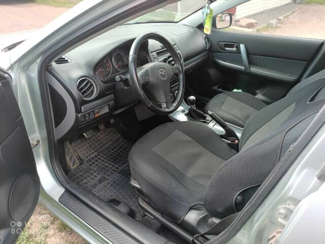 Серый Мазда 6, объемом двигателя 2 л и пробегом 235 тыс. км за 5400 $, фото 2 на Automoto.ua