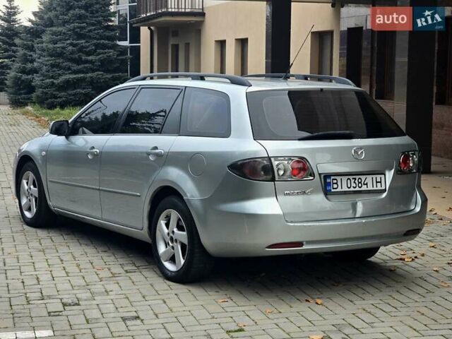 Сірий Мазда 6, об'ємом двигуна 2 л та пробігом 297 тис. км за 3300 $, фото 4 на Automoto.ua