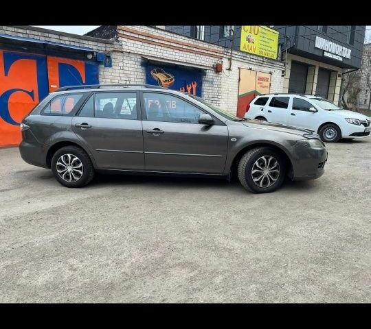 Серый Мазда 6, объемом двигателя 2 л и пробегом 143 тыс. км за 4750 $, фото 3 на Automoto.ua