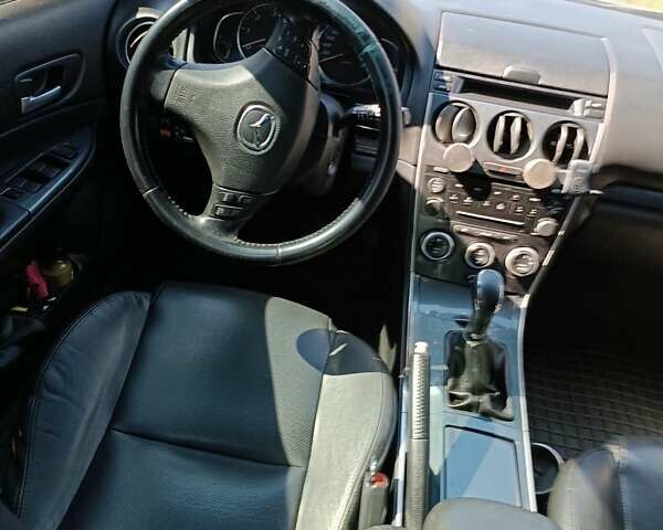 Серый Мазда 6, объемом двигателя 2 л и пробегом 95 тыс. км за 7300 $, фото 4 на Automoto.ua
