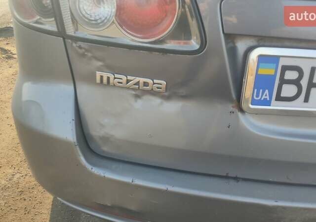 Сірий Мазда 6, об'ємом двигуна 2 л та пробігом 388 тис. км за 3800 $, фото 9 на Automoto.ua