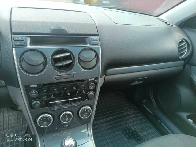 Серый Мазда 6, объемом двигателя 2 л и пробегом 235 тыс. км за 5400 $, фото 5 на Automoto.ua