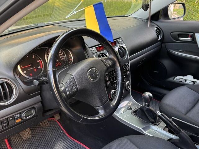 Серый Мазда 6, объемом двигателя 2 л и пробегом 218 тыс. км за 4000 $, фото 5 на Automoto.ua