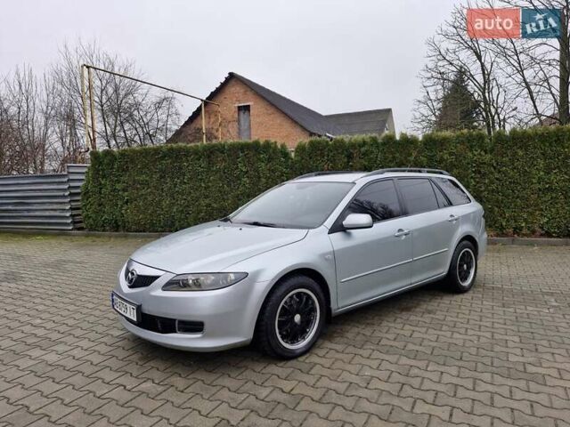 Сірий Мазда 6, об'ємом двигуна 2 л та пробігом 215 тис. км за 4250 $, фото 2 на Automoto.ua