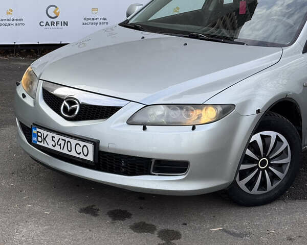 Сірий Мазда 6, об'ємом двигуна 2 л та пробігом 272 тис. км за 3999 $, фото 2 на Automoto.ua