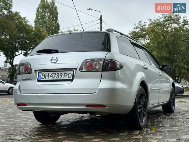 Серый Мазда 6, объемом двигателя 2 л и пробегом 427 тыс. км за 3400 $, фото 10 на Automoto.ua