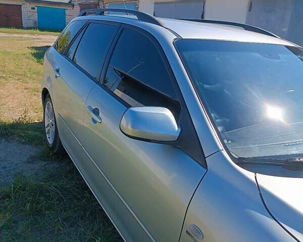 Серый Мазда 6, объемом двигателя 2 л и пробегом 95 тыс. км за 7300 $, фото 6 на Automoto.ua