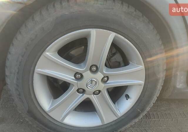 Сірий Мазда 6, об'ємом двигуна 2 л та пробігом 388 тис. км за 3800 $, фото 10 на Automoto.ua