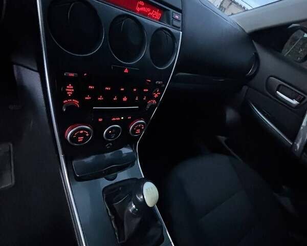 Серый Мазда 6, объемом двигателя 2 л и пробегом 368 тыс. км за 4600 $, фото 9 на Automoto.ua