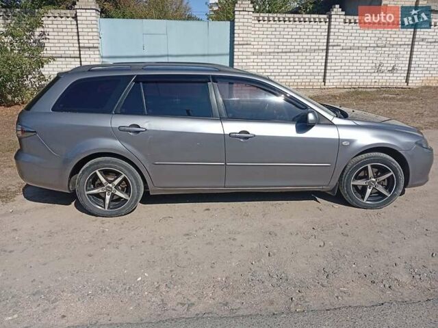 Серый Мазда 6, объемом двигателя 2 л и пробегом 327 тыс. км за 4400 $, фото 3 на Automoto.ua