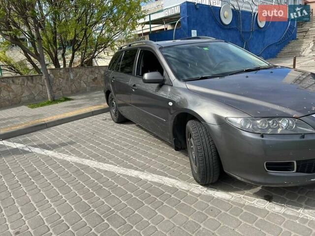 Серый Мазда 6, объемом двигателя 2.3 л и пробегом 393 тыс. км за 4500 $, фото 7 на Automoto.ua