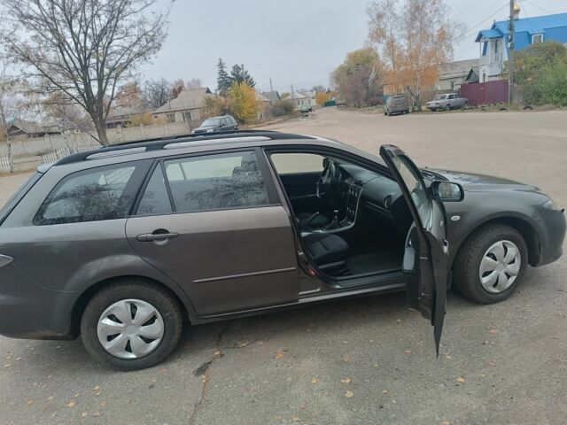 Сірий Мазда 6, об'ємом двигуна 2 л та пробігом 390 тис. км за 4800 $, фото 7 на Automoto.ua