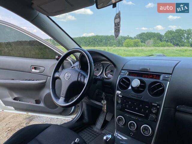 Серый Мазда 6, объемом двигателя 1.8 л и пробегом 211 тыс. км за 4700 $, фото 25 на Automoto.ua