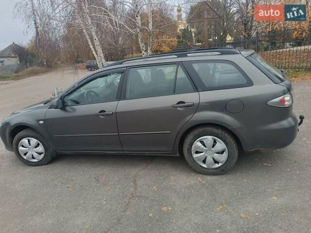 Сірий Мазда 6, об'ємом двигуна 2 л та пробігом 390 тис. км за 4800 $, фото 7 на Automoto.ua