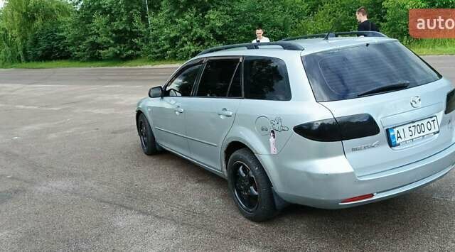 Сірий Мазда 6, об'ємом двигуна 2 л та пробігом 316 тис. км за 4200 $, фото 2 на Automoto.ua