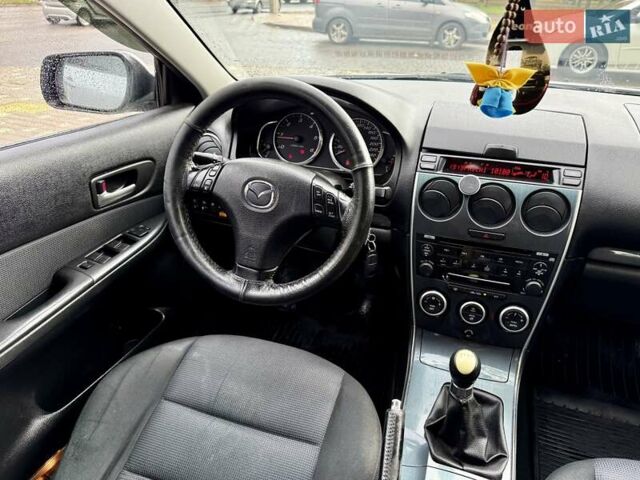Серый Мазда 6, объемом двигателя 2 л и пробегом 427 тыс. км за 3400 $, фото 67 на Automoto.ua