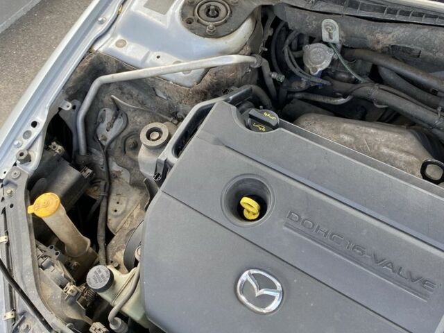 Серый Мазда 6, объемом двигателя 1.8 л и пробегом 217 тыс. км за 3500 $, фото 2 на Automoto.ua