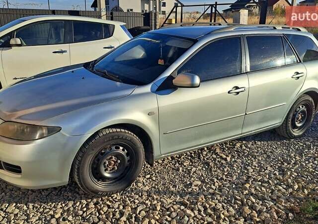 Серый Мазда 6, объемом двигателя 2 л и пробегом 295 тыс. км за 4100 $, фото 9 на Automoto.ua