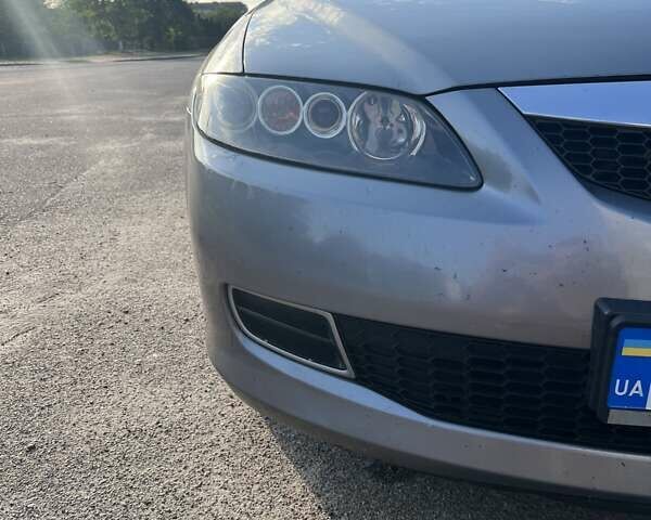 Серый Мазда 6, объемом двигателя 2 л и пробегом 290 тыс. км за 4200 $, фото 8 на Automoto.ua