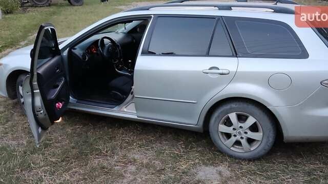 Серый Мазда 6, объемом двигателя 2 л и пробегом 250 тыс. км за 4500 $, фото 1 на Automoto.ua