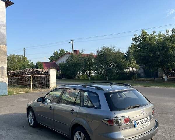 Серый Мазда 6, объемом двигателя 2 л и пробегом 290 тыс. км за 4200 $, фото 1 на Automoto.ua