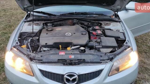 Серый Мазда 6, объемом двигателя 2 л и пробегом 250 тыс. км за 4500 $, фото 2 на Automoto.ua
