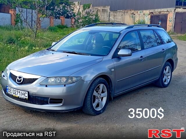 Серый Мазда 6, объемом двигателя 2 л и пробегом 280 тыс. км за 3500 $, фото 4 на Automoto.ua