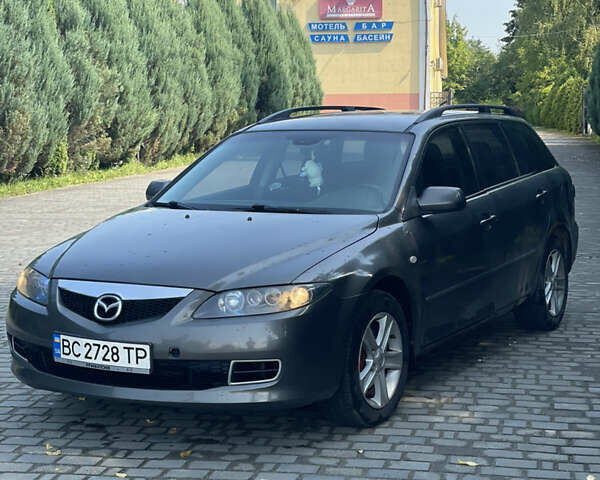 Серый Мазда 6, объемом двигателя 2 л и пробегом 377 тыс. км за 4000 $, фото 1 на Automoto.ua