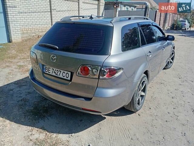 Серый Мазда 6, объемом двигателя 2 л и пробегом 327 тыс. км за 4400 $, фото 5 на Automoto.ua