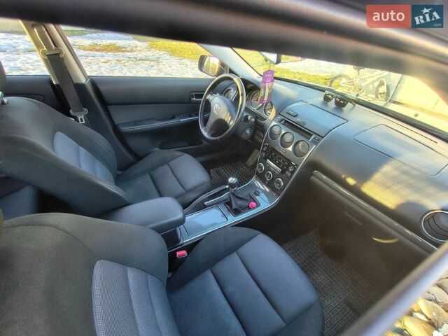 Серый Мазда 6, объемом двигателя 2 л и пробегом 324 тыс. км за 3850 $, фото 2 на Automoto.ua