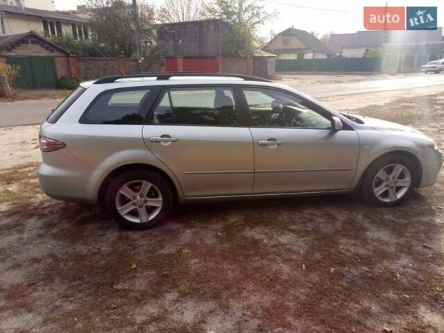 Серый Мазда 6, объемом двигателя 2 л и пробегом 247 тыс. км за 5350 $, фото 2 на Automoto.ua