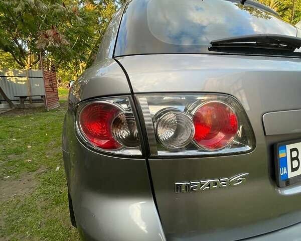 Серый Мазда 6, объемом двигателя 2 л и пробегом 393 тыс. км за 4000 $, фото 2 на Automoto.ua