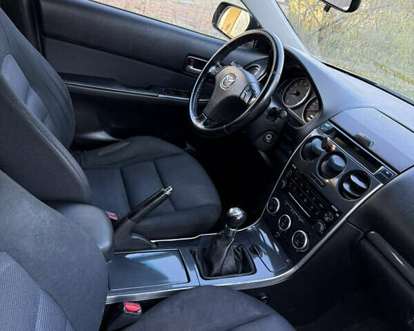 Серый Мазда 6, объемом двигателя 2 л и пробегом 254 тыс. км за 2999 $, фото 20 на Automoto.ua