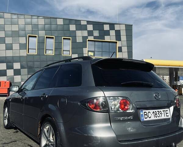 Серый Мазда 6, объемом двигателя 2 л и пробегом 300 тыс. км за 4000 $, фото 2 на Automoto.ua