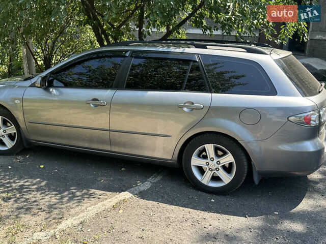 Серый Мазда 6, объемом двигателя 2 л и пробегом 291 тыс. км за 5000 $, фото 5 на Automoto.ua