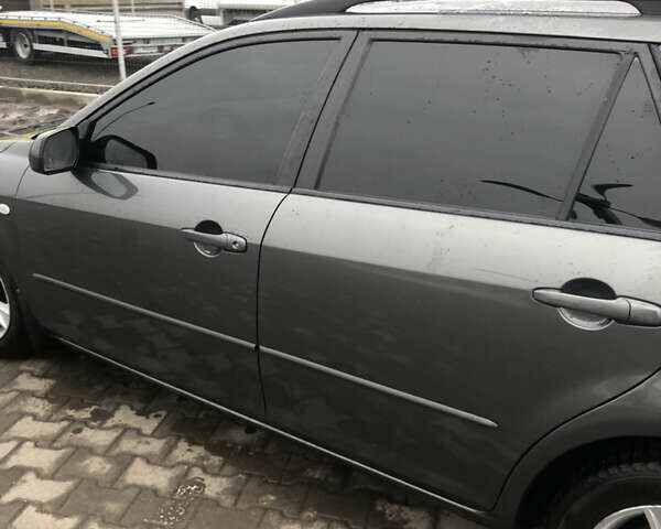 Серый Мазда 6, объемом двигателя 2 л и пробегом 214 тыс. км за 4800 $, фото 2 на Automoto.ua