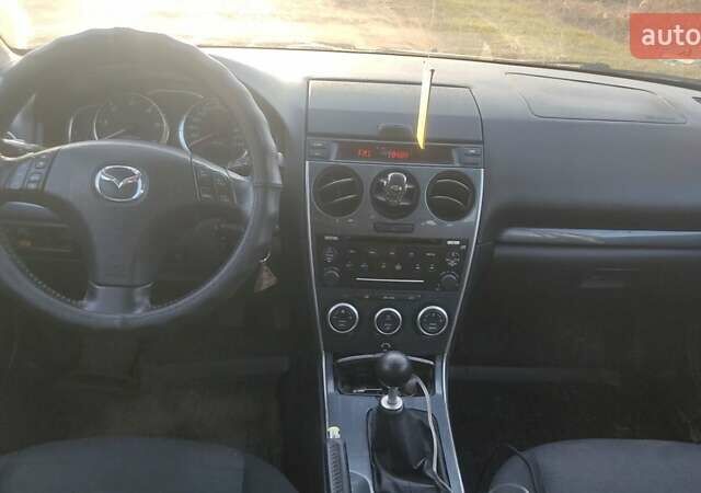 Сірий Мазда 6, об'ємом двигуна 2 л та пробігом 388 тис. км за 3800 $, фото 5 на Automoto.ua