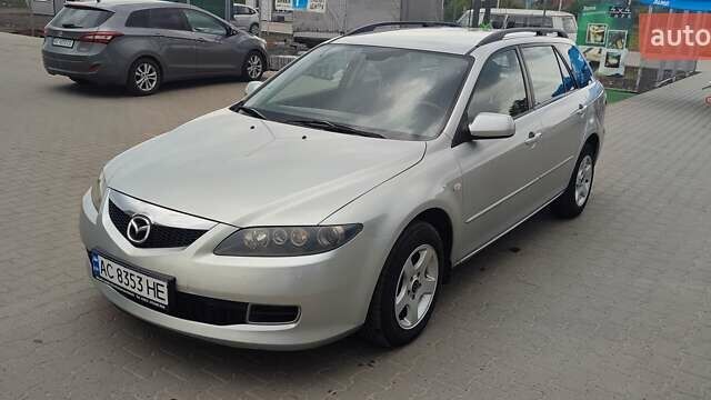 Сірий Мазда 6, об'ємом двигуна 2 л та пробігом 300 тис. км за 4250 $, фото 1 на Automoto.ua