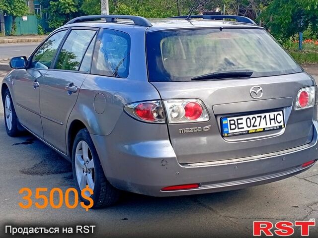 Серый Мазда 6, объемом двигателя 2 л и пробегом 280 тыс. км за 3500 $, фото 5 на Automoto.ua