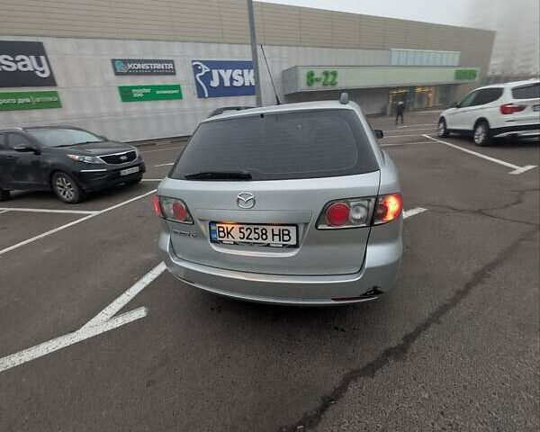 Серый Мазда 6, объемом двигателя 2 л и пробегом 234 тыс. км за 4600 $, фото 2 на Automoto.ua