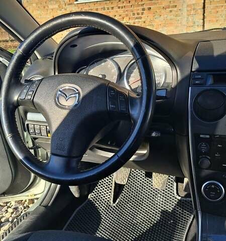 Серый Мазда 6, объемом двигателя 2 л и пробегом 295 тыс. км за 4100 $, фото 10 на Automoto.ua
