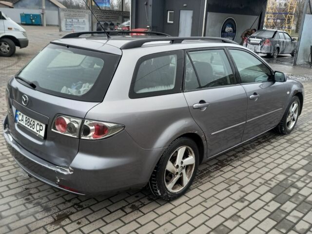 Серый Мазда 6, объемом двигателя 2 л и пробегом 360 тыс. км за 3500 $, фото 3 на Automoto.ua