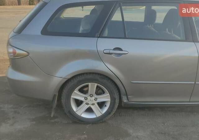 Сірий Мазда 6, об'ємом двигуна 2 л та пробігом 388 тис. км за 3800 $, фото 2 на Automoto.ua