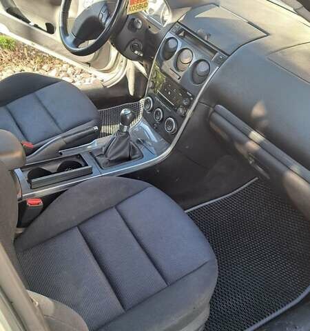 Серый Мазда 6, объемом двигателя 2 л и пробегом 295 тыс. км за 4100 $, фото 1 на Automoto.ua